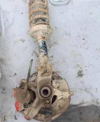 Front wheel hub spindle knuckle