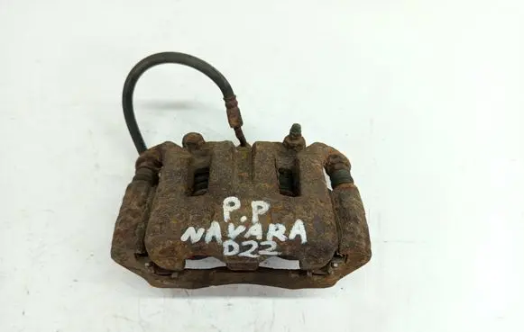 Nissan Navara D22 Front brake caliper ZACISKPPNAVD22