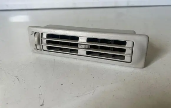 Volkswagen Multivan T4 Dash center air vent grill 703820963