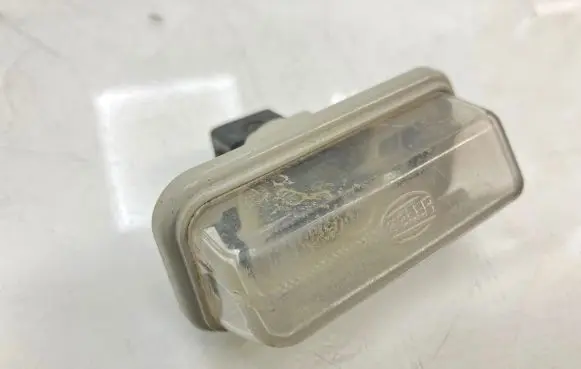 Toyota Avensis T250 Number plate light E1001479