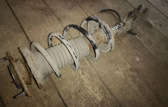 Toyota Yaris Front shock absorber with coil spring