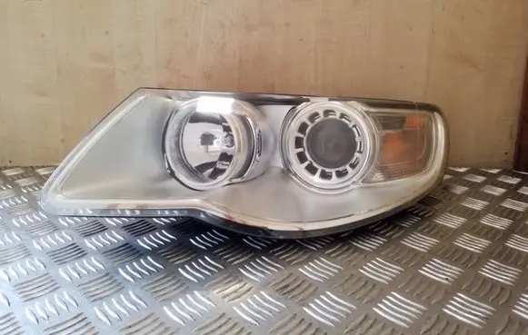 Volkswagen Touareg I Headlight/headlamp 7L6941031A 1LL247032
