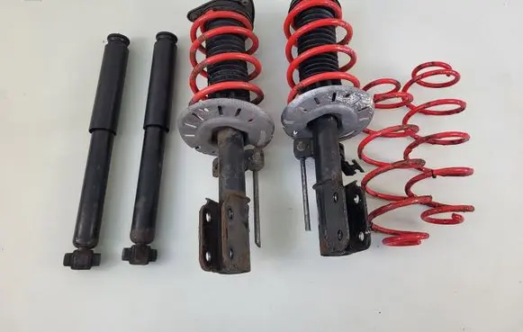 Peugeot 308 Front shock absorber with coil spring 9809104780