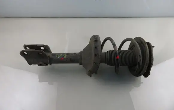 Subaru Legacy Front shock absorber with coil spring