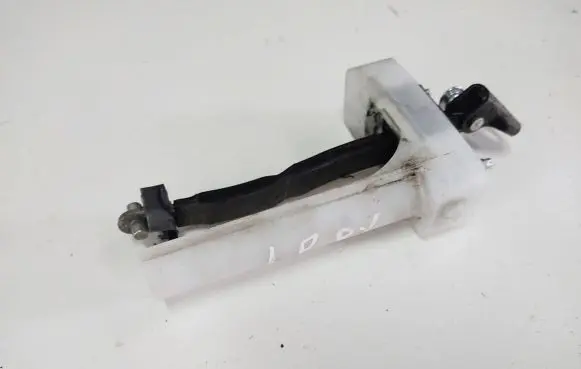 Front door check strap stopper