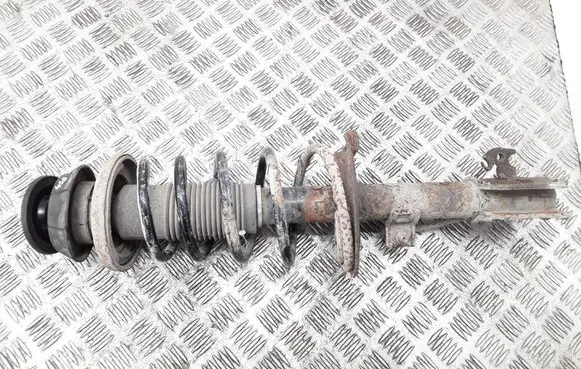 Suzuki Swift I Front shock absorber with coil spring 4160262J11