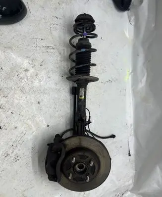 Suzuki Swift III Front shock absorber with coil spring 41602-53R00