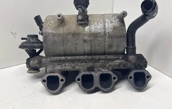 Volkswagen Golf V Intake manifold 038129713BE