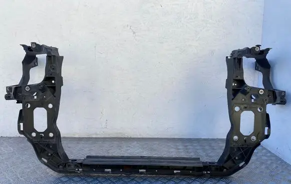 Radiator support slam panel