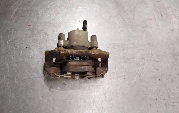 Mazda 3 II Front brake caliper