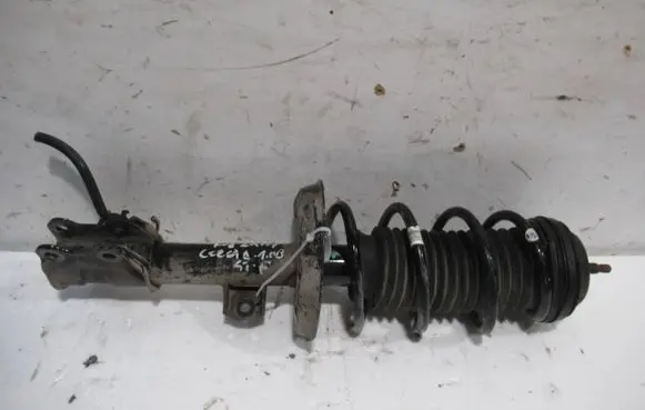 Opel Corsa D Front shock absorber/damper 13343097