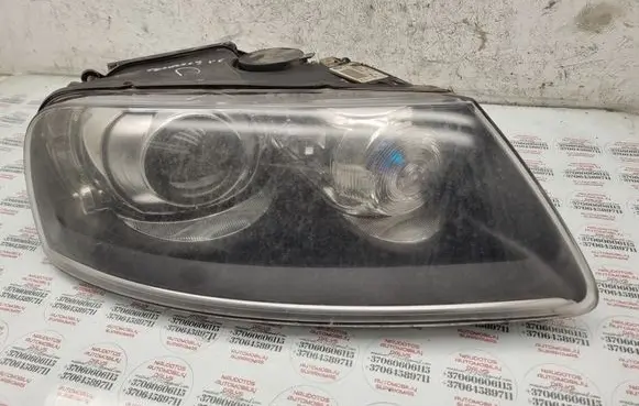 Volkswagen Touareg I Headlight/headlamp 7L6941016AM