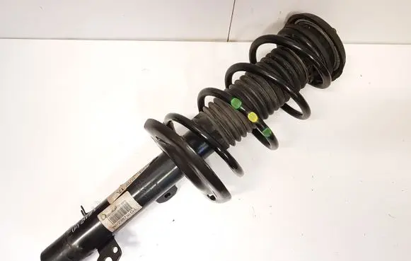 Front shock absorber with coil spring