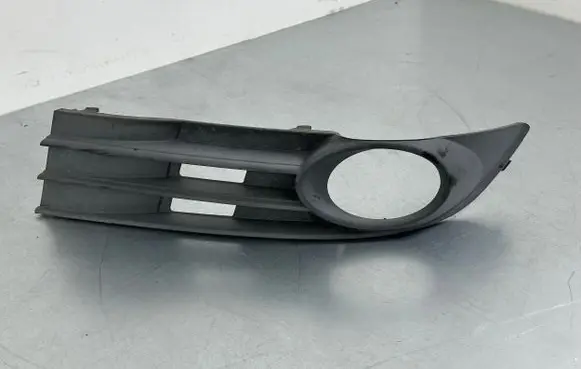 Volkswagen Touran I Front bumper lower grill 1T0853665K