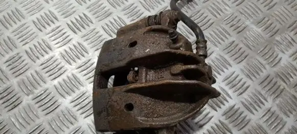 Mitsubishi Carisma Front brake caliper 323281134