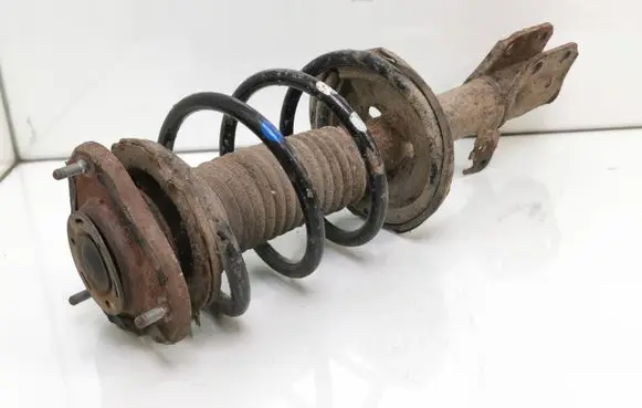 Toyota Avensis T250 Front shock absorber with coil spring