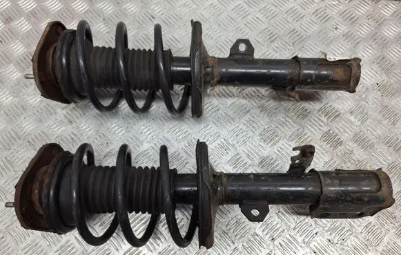 Front shock absorber with coil spring