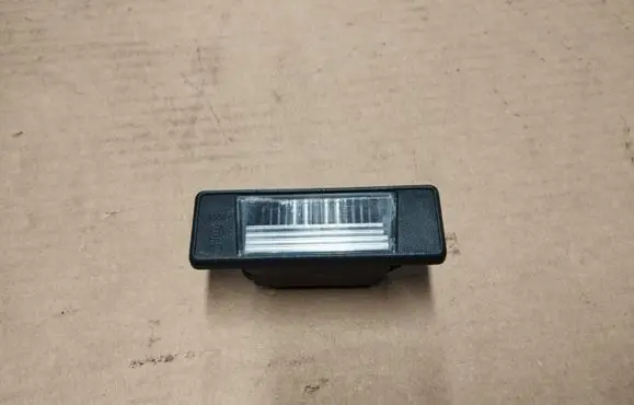 Nissan Qashqai Number plate light 26510JD00A