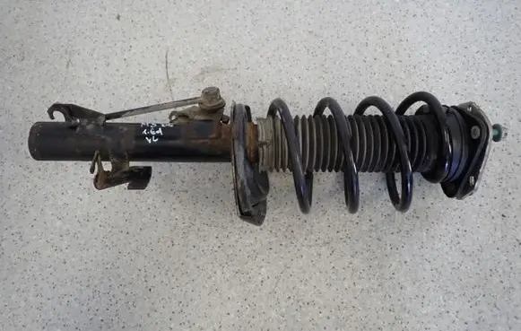 Mazda 3 I Front shock absorber with coil spring 