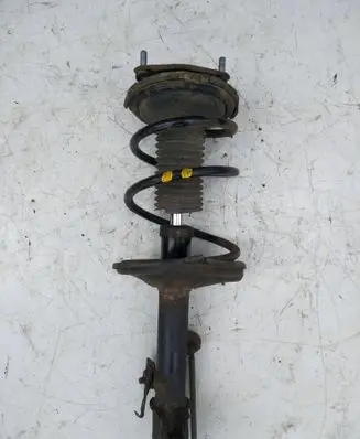 Front shock absorber with coil spring
