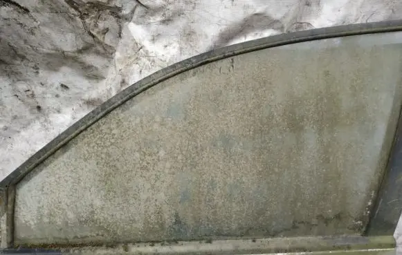Mazda 626 Front door window glass four-door