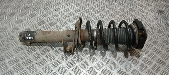 Volkswagen PASSAT B7 Front shock absorber with coil spring 