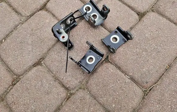 Front door lower hinge