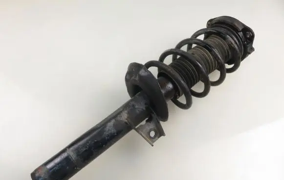 Volkswagen PASSAT B6 Front shock absorber with coil spring 335808