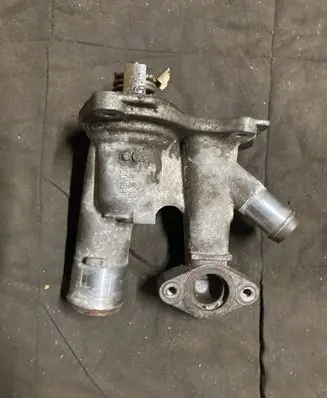 Thermostat/thermostat housing