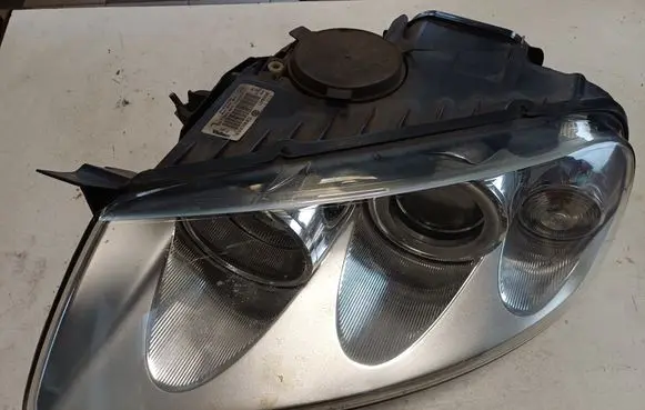 Volkswagen Touareg I Headlight/headlamp 7L6941015BL