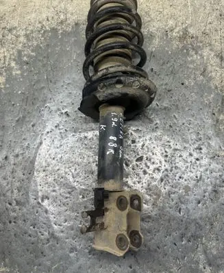 Opel Zafira B Front shock absorber with coil spring