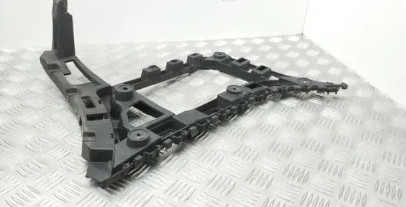 Volkswagen Jetta VI Bumper support mounting bracket corner 5C6807393