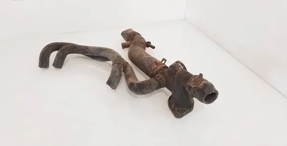 Volkswagen Golf IV Engine coolant pipe/hose 06A121133J