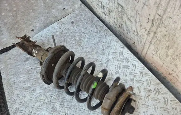 Volvo XC90 Front shock absorber with coil spring 31200416