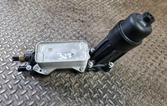 Oil filter mounting bracket