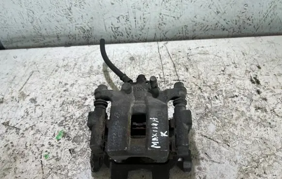 Nissan Maxima A35 Rear brake caliper