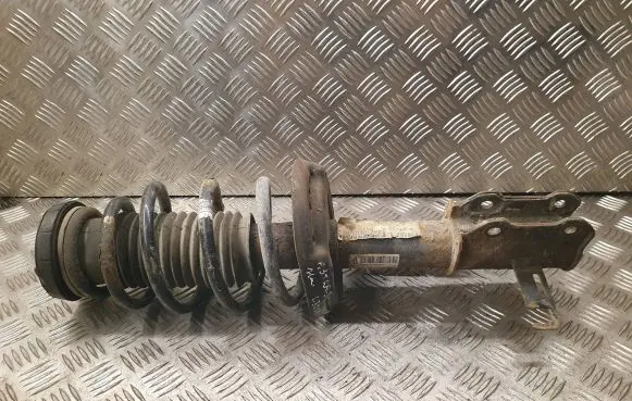 Opel Astra J Front shock absorber with coil spring 13354011