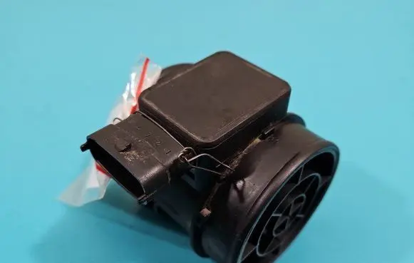 Opel Zafira B Mass air flow meter 24404016 IMPRK1421602