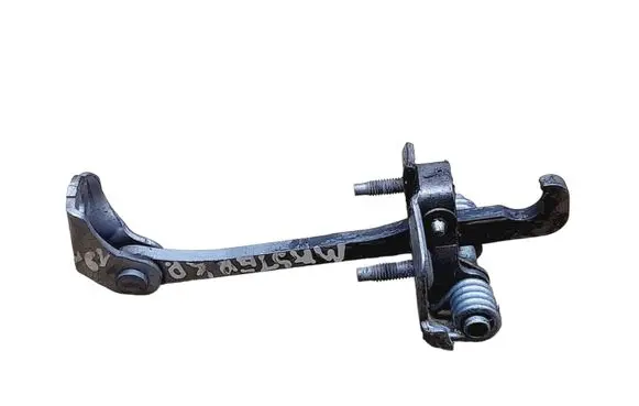 Front door check strap stopper