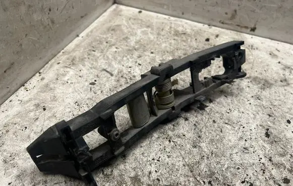 Rear door exterior handle/bracket