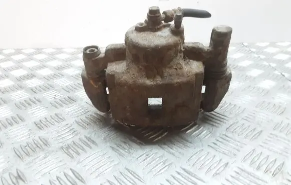 Mazda 323 Front brake caliper