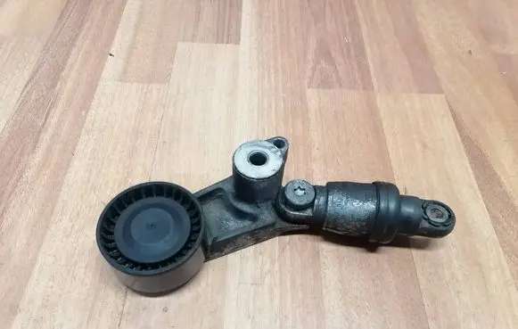 Renault Espace V (RFC) Generator/alternator belt tensioner F61211102 117501769R