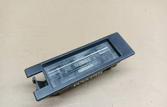 Opel Astra H Number plate light 0461200