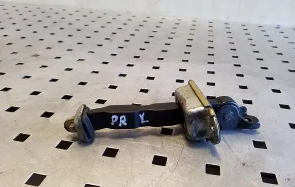 Front door check strap stopper