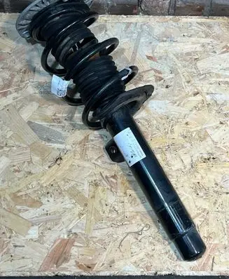 Front shock absorber with coil spring