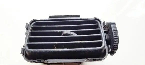 Mitsubishi Lancer Dash center air vent grill