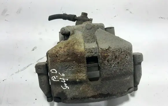 Volkswagen Golf VI Front brake caliper 