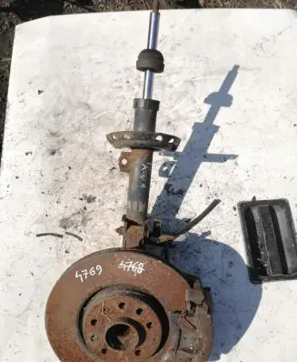 Opel Zafira B Front wheel hub spindle knuckle 22214602