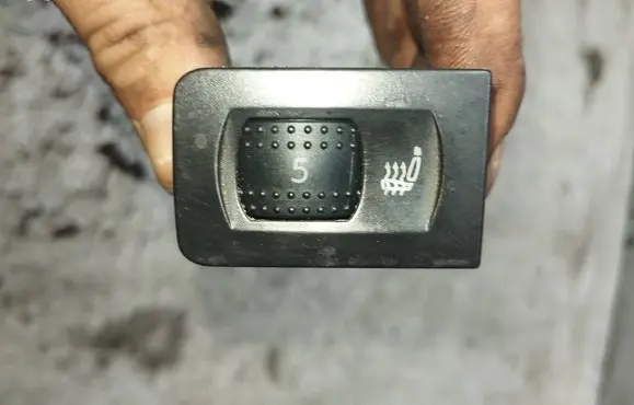 Seat heating switch
