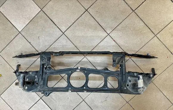 Radiator support slam panel